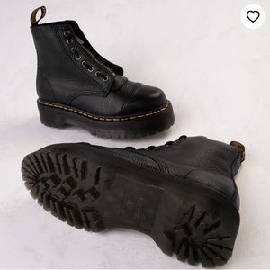 Dr. Martens rocks a unique design with the option of lacing up or zipping up.